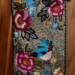 Mary Frances Beaded Clutch can wear 5” wide by 8” tall or 5” tall by 8” wide